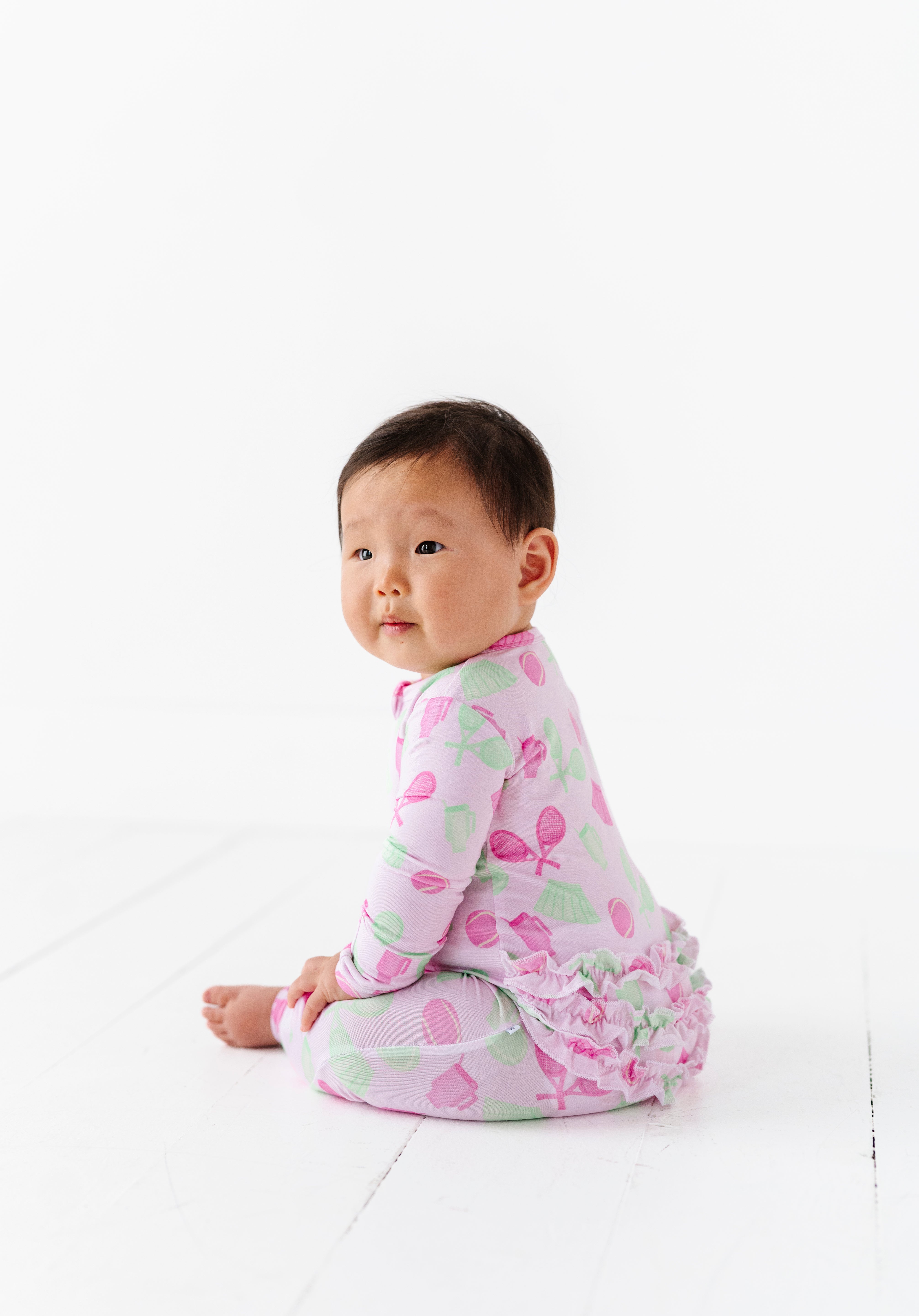 Tennis Ruffle Zipper Onesie