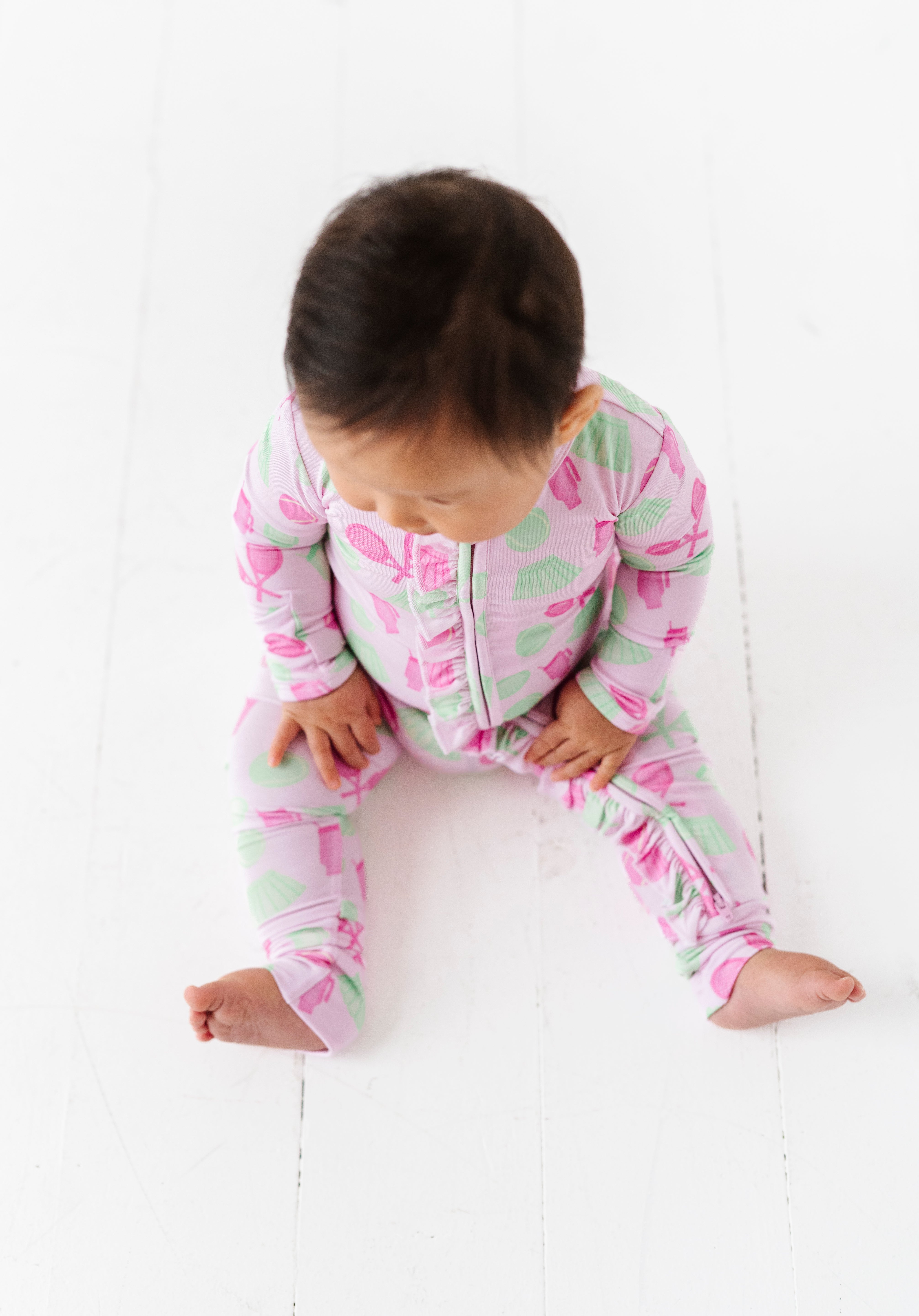 Tennis Ruffle Zipper Onesie