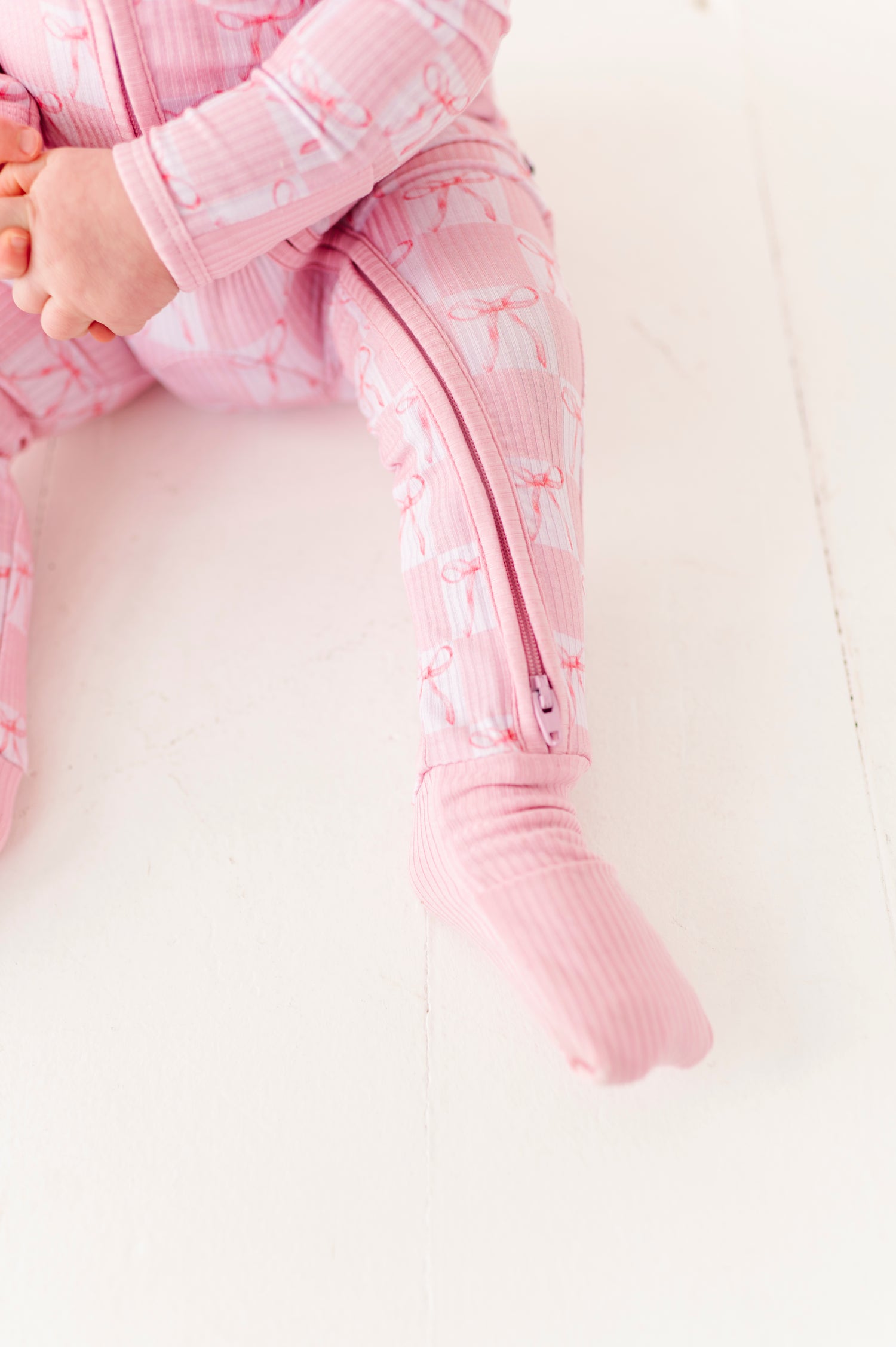 Pink Check with Bows Zipper Onesie