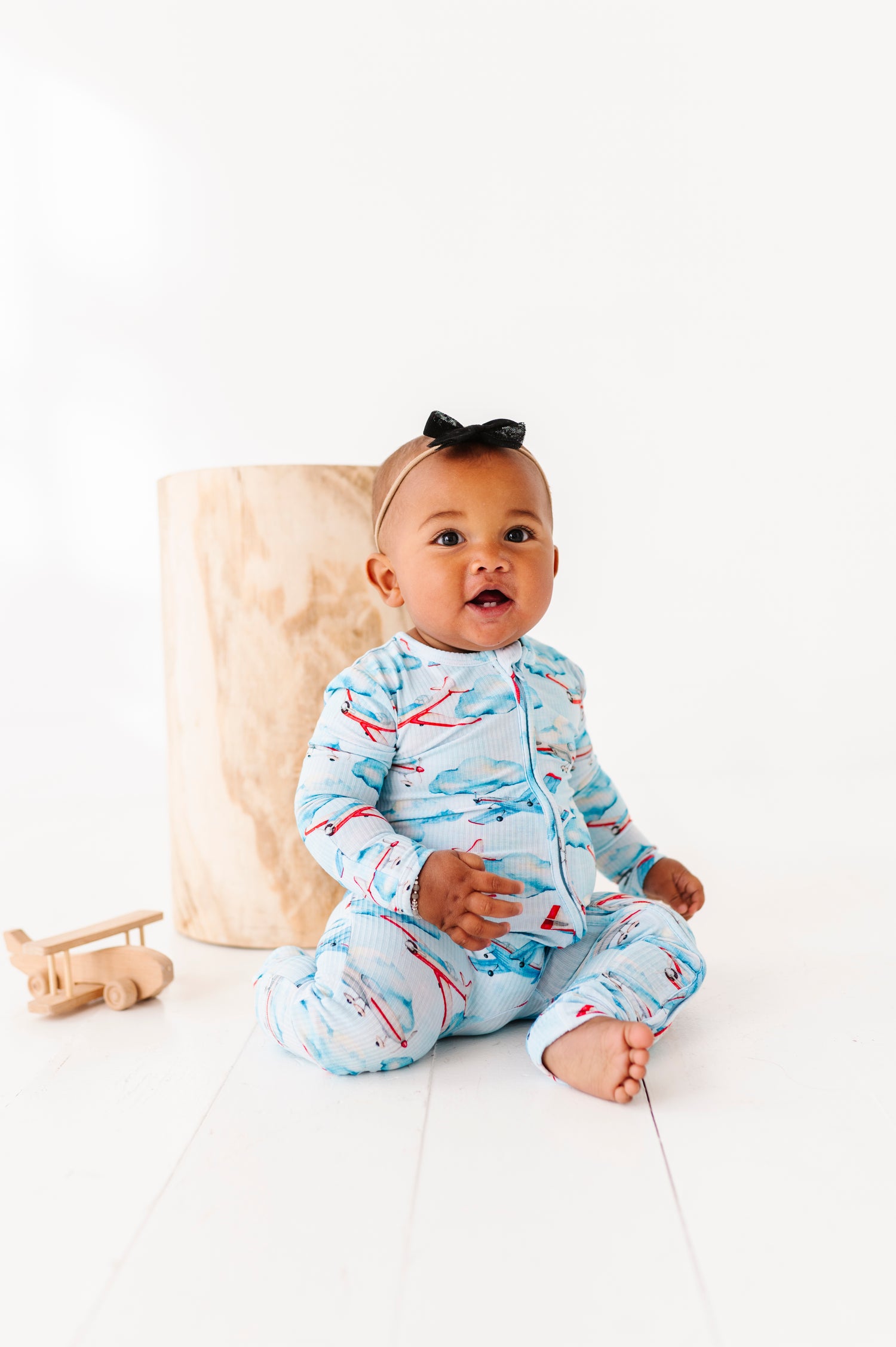 Ribbed Plane and Clouds Zipper Onesie