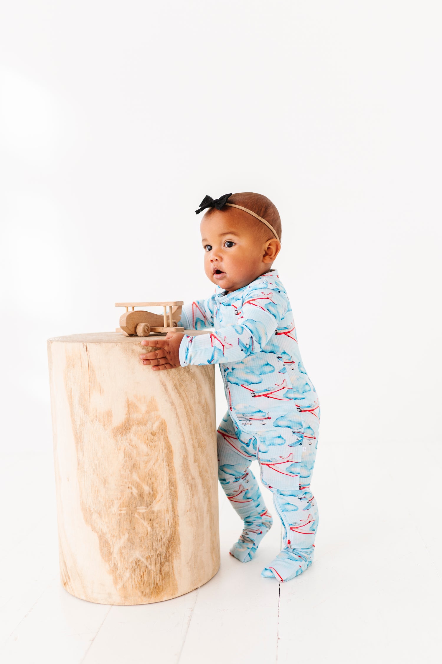Ribbed Plane and Clouds Zipper Onesie