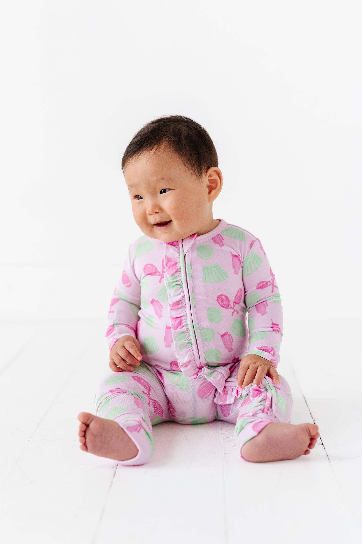Tennis Ruffle Zipper Onesie